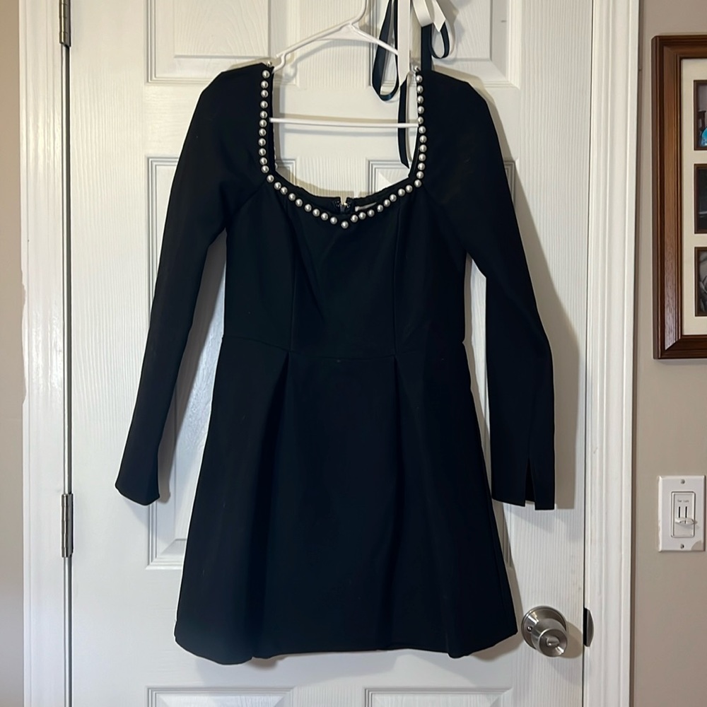long sleeve black dress with pearl accents